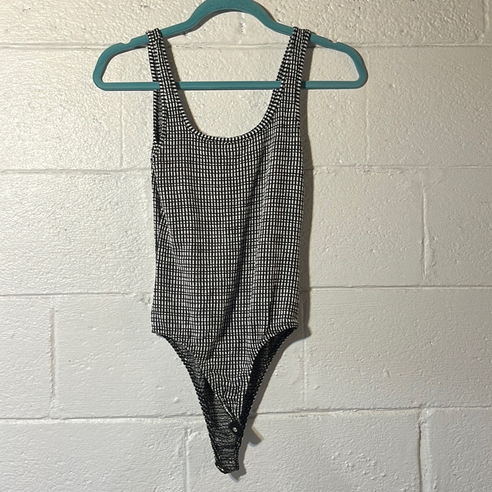 black and white body suit